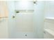 Bright shower featuring white subway tile, a tiled shower base, and golden fixtures at 10 Bayshore Blvd, Goose Creek, SC 29445