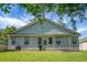 Spacious backyard with lush green grass, swing set, and serene atmosphere at 1026 Briar Rose Ln, Ladson, SC 29456
