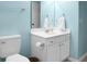Bathroom featuring a white vanity, toilet, and light blue walls at 1026 Briar Rose Ln, Ladson, SC 29456
