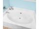 Angled view of a large white soaking tub with chrome fixtures at 1026 Briar Rose Ln, Ladson, SC 29456