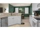 Well-lit kitchen with modern appliances and seamless flow into the dining space at 1026 Briar Rose Ln, Ladson, SC 29456