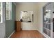 Bright sunroom with hardwood floors, large windows, and a sliding door for natural light at 1026 Briar Rose Ln, Ladson, SC 29456