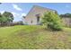 Spacious backyard featuring a lush lawn and home's exterior at 108 Larkspur Dr, Goose Creek, SC 29445