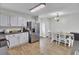 Charming kitchen and dining area with white cabinets, modern appliances, and a cozy atmosphere for Gathering meals at 108 Larkspur Dr, Goose Creek, SC 29445