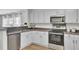 Well-equipped kitchen boasting stainless steel appliances, modern cabinetry, and a functional layout for easy meal preparation at 108 Larkspur Dr, Goose Creek, SC 29445