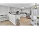 A modern kitchen with stainless steel appliances, sleek countertops, and a breakfast bar perfect for casual dining at 108 Larkspur Dr, Goose Creek, SC 29445