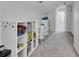 A well-organized playroom with storage shelving, table and chairs at 108 Larkspur Dr, Goose Creek, SC 29445