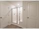 Bathroom featuring a glass shower, tile flooring, and white doors at 112 Whisper Dr, Summerville, SC 29485