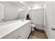 Bathroom featuring a double sink vanity, framed mirror, tile flooring, and a patterned shower curtain at 112 Whisper Dr, Summerville, SC 29485