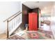 Elegant foyer featuring hardwood floors, a staircase with white railings, and a decorative area rug at 112 Whisper Dr, Summerville, SC 29485