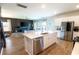 Modern kitchen with stainless steel appliances, central island, and open layout perfect for entertaining and Gathering gatherings at 112 Whisper Dr, Summerville, SC 29485
