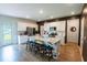 Modern kitchen features stainless steel appliances, granite countertops, island seating, and abundant storage in a sleek design at 112 Whisper Dr, Summerville, SC 29485
