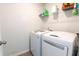 Laundry room featuring a washer and dryer, and wire shelving at 112 Whisper Dr, Summerville, SC 29485