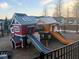 Playground structures featuring small playhouses with slides and a tube, set in a fenced-in area at 112 Whisper Dr, Summerville, SC 29485