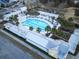 Aerial view of a spacious pool surrounded by palm trees and lounge chairs at 112 Whisper Dr, Summerville, SC 29485