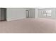 Spacious bonus room offers versatility and features neutral carpeting, recessed lighting, and lots of natural light at 113 Petrell Rd, Summerville, SC 29483