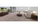 Bright living room features modern furnishings, a decorative rug, and a large flat screen TV for comfortable living at 113 Petrell Rd, Summerville, SC 29483