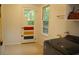 A spacious laundry room with updated appliances and an exterior view at 1195 Framptons Inlet Rd, Edisto Island, SC 29438