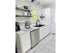 Modern kitchen with white cabinets, stainless steel appliances, and sleek countertops at 1207 Saint Johns Ave, Moncks Corner, SC 29461