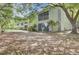 Backyard featuring lush trees and groundcover, offering a serene outdoor setting at 1208 Village Creek Ln Ln # 1, Mount Pleasant, SC 29464