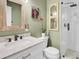 Bathroom featuring a modern vanity with marble countertop, decorative mirrors, and a walk-in shower at 1208 Village Creek Ln Ln # 1, Mount Pleasant, SC 29464