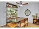 Cozy dining room with rustic shelving and ample natural light at 1208 Village Creek Ln Ln # 1, Mount Pleasant, SC 29464