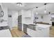 Stylish kitchen with stainless steel appliances, white cabinetry, and hardwood floors at 1208 Village Creek Ln Ln # 1, Mount Pleasant, SC 29464