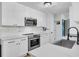 Updated kitchen with stainless steel appliances, white cabinetry, and plenty of counter space at 1208 Village Creek Ln Ln # 1, Mount Pleasant, SC 29464