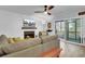 Cozy living room boasts a fireplace, a sliding glass door, and comfortable seating at 1208 Village Creek Ln Ln # 1, Mount Pleasant, SC 29464