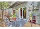 Outdoor patio with a slider and greenery, perfect for relaxation and entertaining at 1208 Village Creek Ln Ln # 1, Mount Pleasant, SC 29464