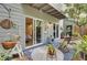 Cozy outdoor patio with stylish decor, comfortable seating, and access to the interior of the home at 1208 Village Creek Ln Ln # 1, Mount Pleasant, SC 29464