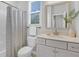 Well-lit bathroom featuring a shower, vanity, and contemporary fixtures and finishes at 121 Brown Swiss Cir, Summerville, SC 29483