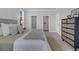 Serene bedroom showcasing a comfortable bed, stylish decor, and ample closet space at 121 Brown Swiss Cir, Summerville, SC 29483