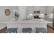 Bright kitchen island featuring quartz countertops, modern appliances, and ample seating at 121 Brown Swiss Cir, Summerville, SC 29483