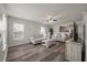 Inviting living room with wood floors, neutral decor, and plenty of natural light at 1219 Bradley Blvd, Summerville, SC 29486