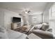 Inviting living room with wood floors, neutral decor, and plenty of natural light at 1219 Bradley Blvd, Summerville, SC 29486