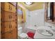 Functional bathroom featuring built-in wooden cabinets and a vintage vanity at 1263 N Highway 52, Moncks Corner, SC 29461