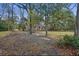 Charming brick home nestled among mature trees at 1263 N Highway 52, Moncks Corner, SC 29461