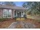 Cozy front porch with decorative trim and wooden deck at 1263 N Highway 52, Moncks Corner, SC 29461