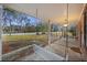 Covered front porch with a swing offers a serene outdoor space at 1263 N Highway 52, Moncks Corner, SC 29461