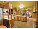 Well-lit kitchen features wooden cabinets, modern appliances, and ample countertop space for meal preparation at 1263 N Highway 52, Moncks Corner, SC 29461