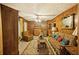 Cozy living room with wood paneling, plush seating, and a decorative ceiling for comfortable relaxation at 1263 N Highway 52, Moncks Corner, SC 29461