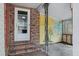 Enclosed side porch, with painted mural, accessible from the exterior at 1263 N Highway 52, Moncks Corner, SC 29461