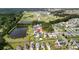 Aerial view of homes in a suburban neighborhood near school athletic fields, with a red pin over the property at 160 Brookhaven Rd, Summerville, SC 29486