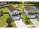 Aerial view of a home with a two-car garage and a well-manicured front yard at 160 Brookhaven Rd, Summerville, SC 29486