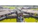 An aerial view of the entrance to Cane Bay High School features a lush, green lawn at 160 Brookhaven Rd, Summerville, SC 29486