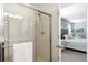 Bathroom featuring glass shower door and view into the main bedroom at 160 Brookhaven Rd, Summerville, SC 29486