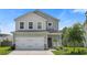 Charming two-story home with a well-kept lawn, a two-car garage, and a welcoming front porch at 160 Brookhaven Rd, Summerville, SC 29486