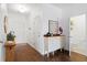 Welcoming foyer with a stylish console table and access to a powder room at 160 Brookhaven Rd, Summerville, SC 29486