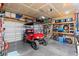 Well-organized garage with golf cart, bikes, and storage racks at 160 Brookhaven Rd, Summerville, SC 29486